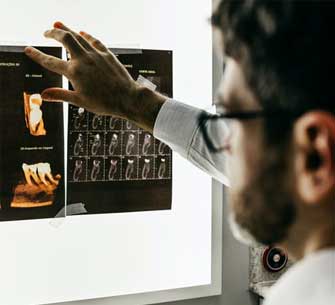 dental student studying x-rays