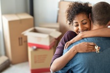 happy young couple in their first home